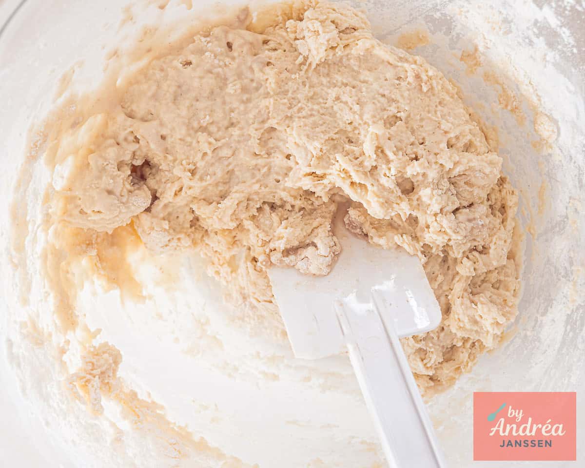 The dough in preparation in a glass bowl.