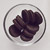 Oreo koekjes in een glazen schaal op een witte ondergrond