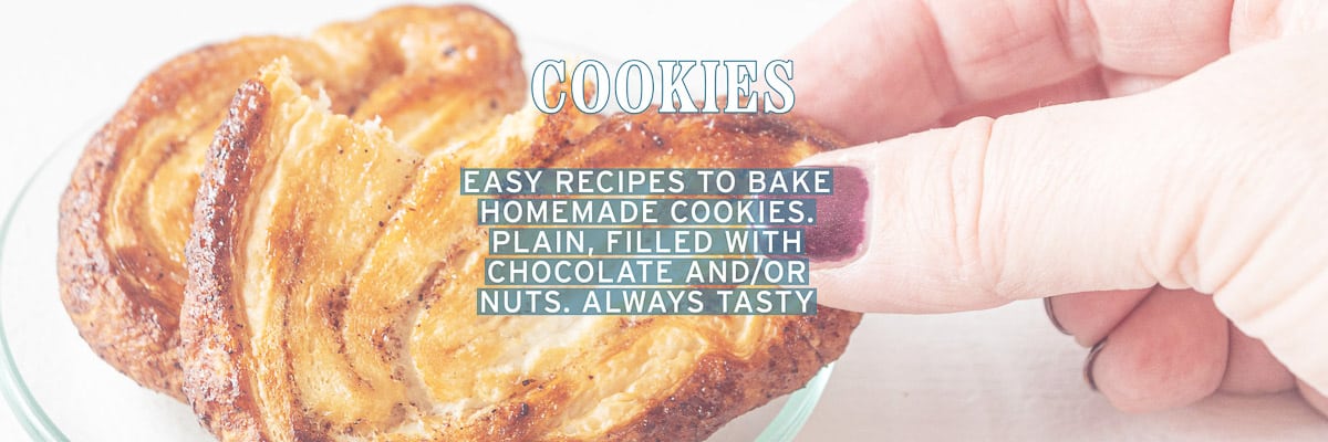 A hand taking a palmier cookie. A text overlay Cookies, easy recipes to bake homemade cookies. Plain, filled with chocolate and/or nuts. Always tasty