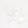A glass filled with 7up on a white background