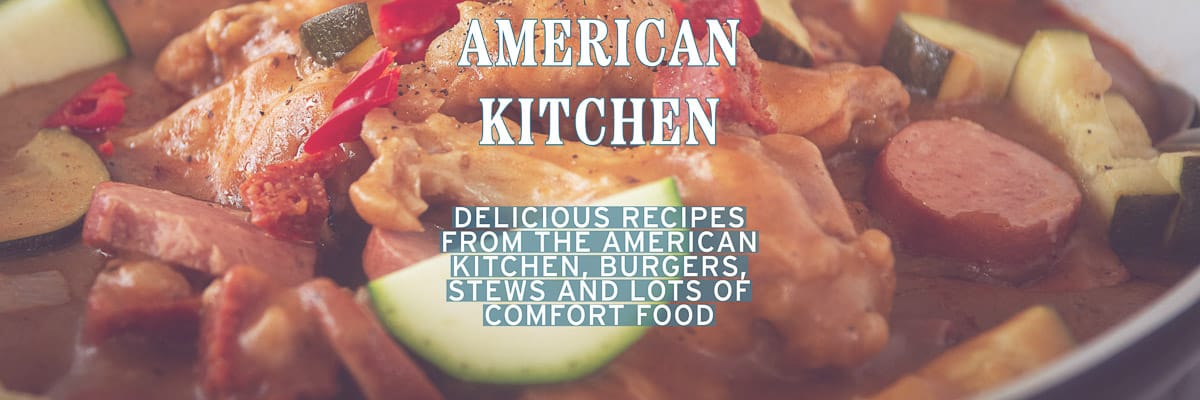 Part of a Gumbo casserole. A text overlay american kitchen, delicious recipes from the american kitchen, burgers, stews and lots of comfort food