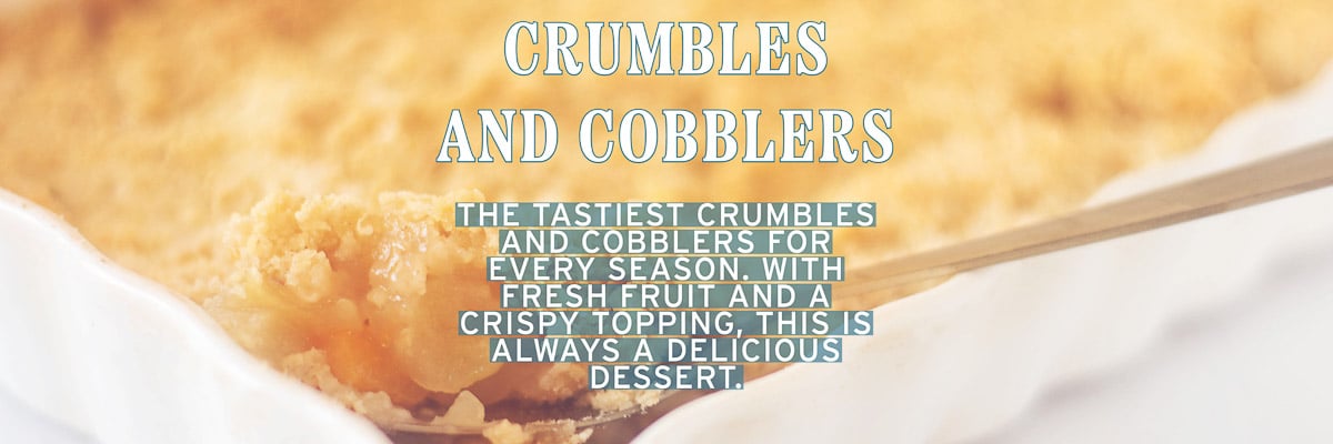 Part of a oven dish filled with crumble. A text overlay crumbles and cobblers, the tastiest crumbles and cobblers for every season. With fresh fruit and a crispy topping. This is always a delicious dessert
