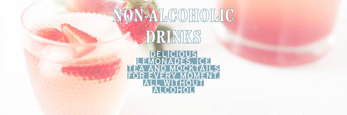 Two glasses of strawberry lemonade. A text overlay non-alcoholic drinks, delicious lemonades, ice tea and mocktails for every moment. All without alcohol