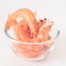 Gamba's in a glass bowl on a white background