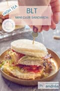 Een gouden bord met een bacon tomaat en sla club sandwich op een grijze ondergrond. Bovenin een textoverlay: BLT mini Sandwich, high tea, makkelijk recept, sandwich